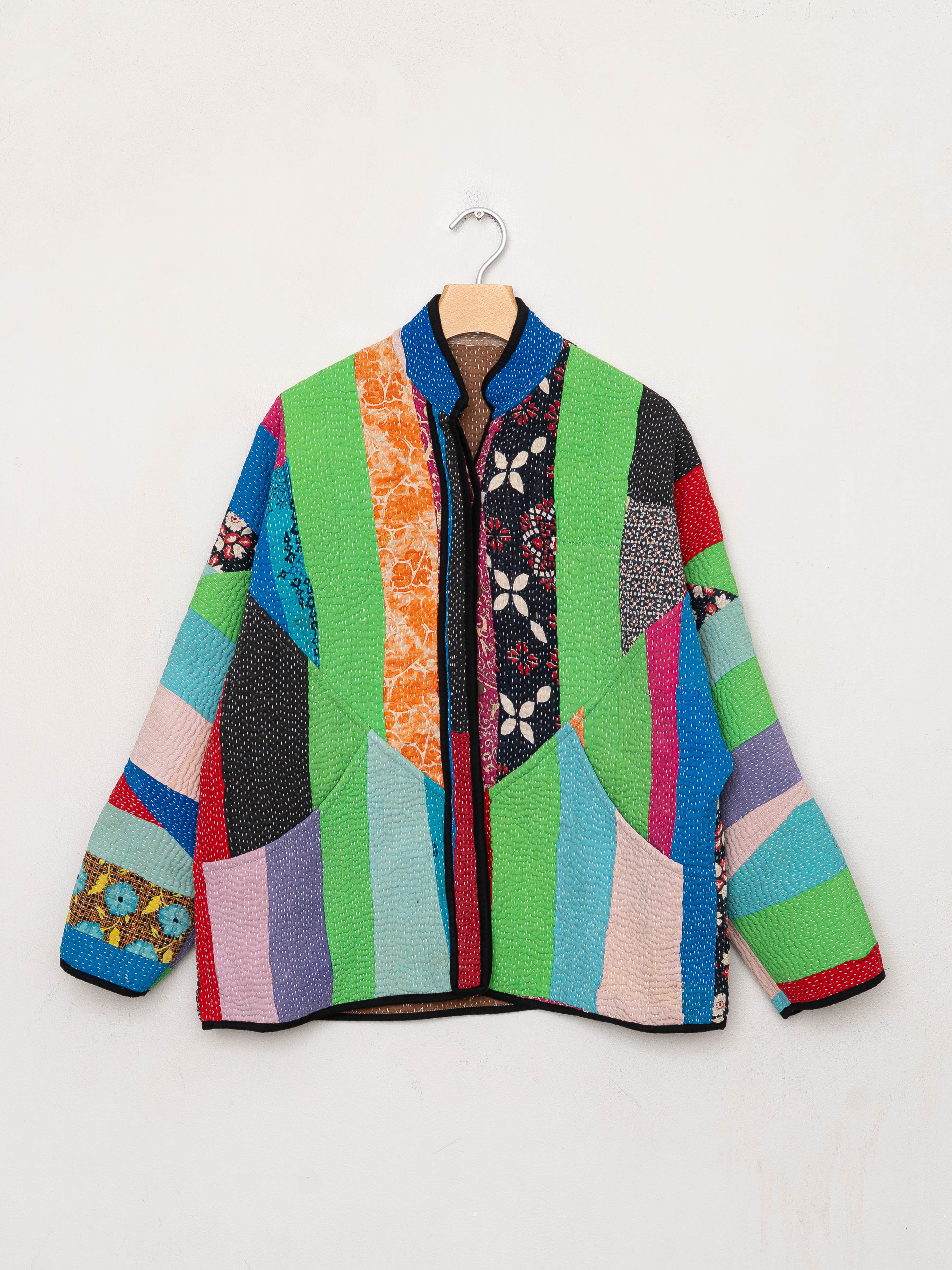 Authentic kantha patchwork jacket made from antique textiles with hand-stitched details