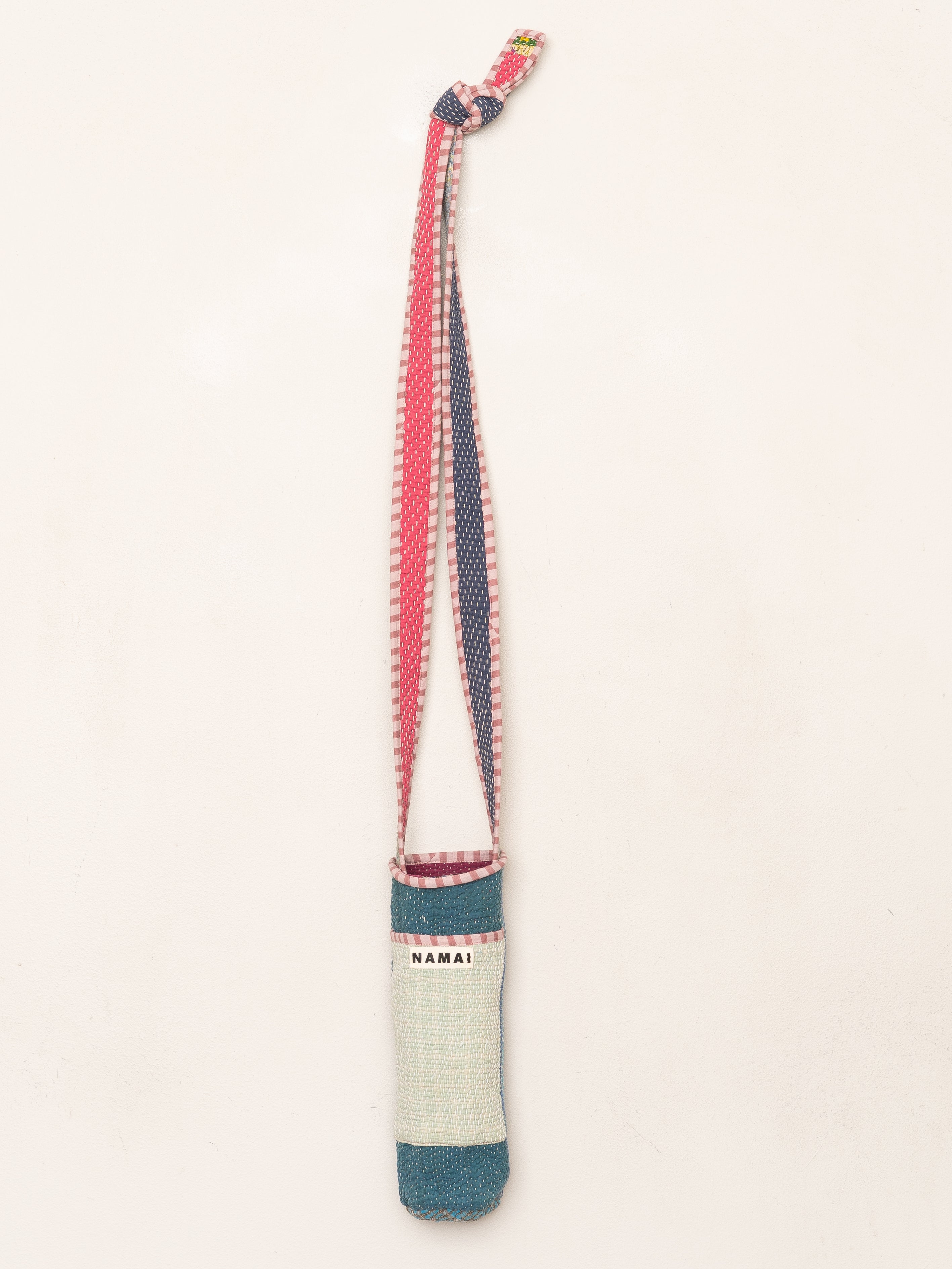 The Lota Quilted Water Bottle Crossbody + NAMAI Water Bottle