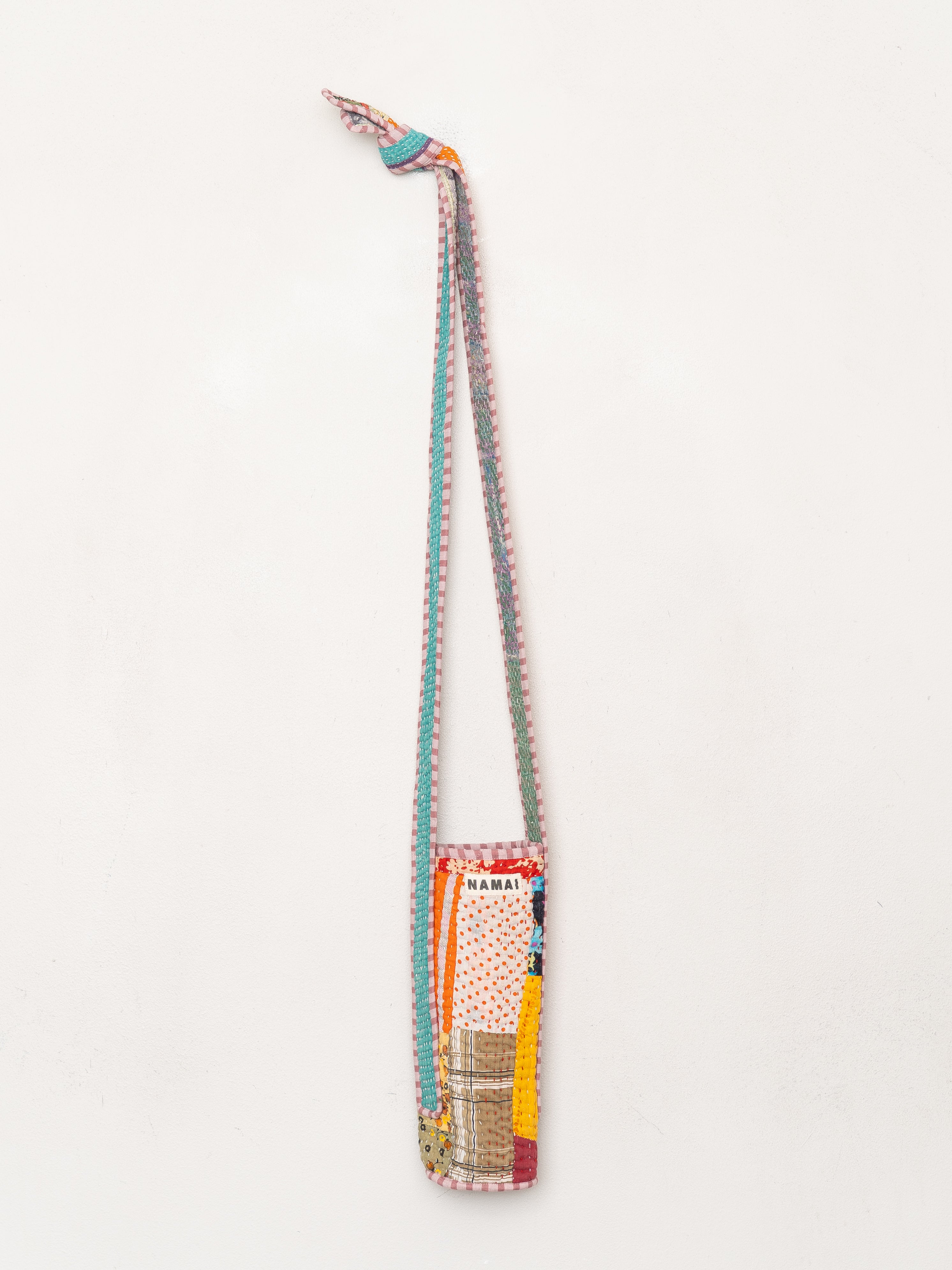 The Lota Quilted Water Bottle Crossbody + NAMAI Water Bottle