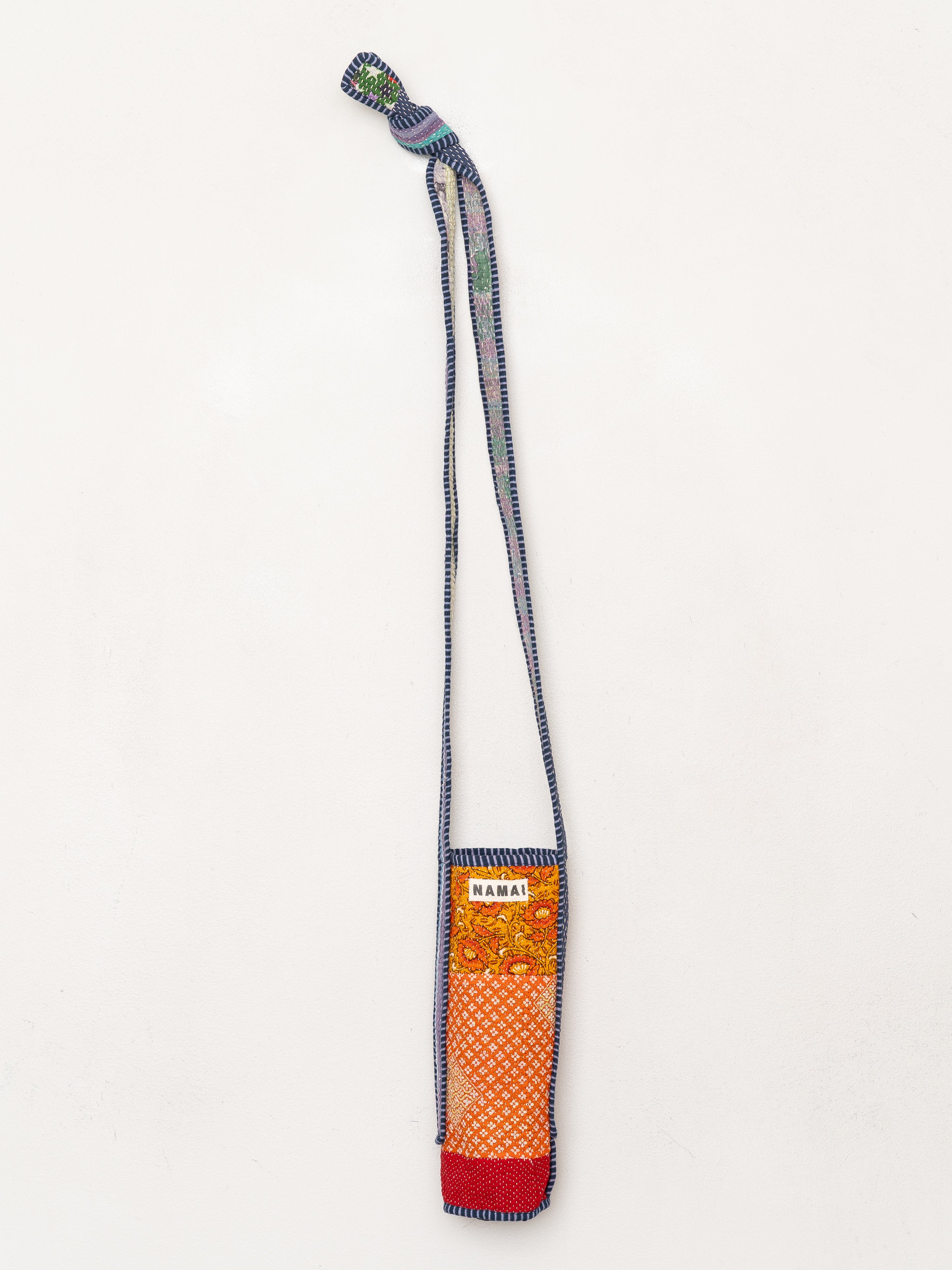 The Lota Quilted Water Bottle Crossbody + NAMAI Water Bottle