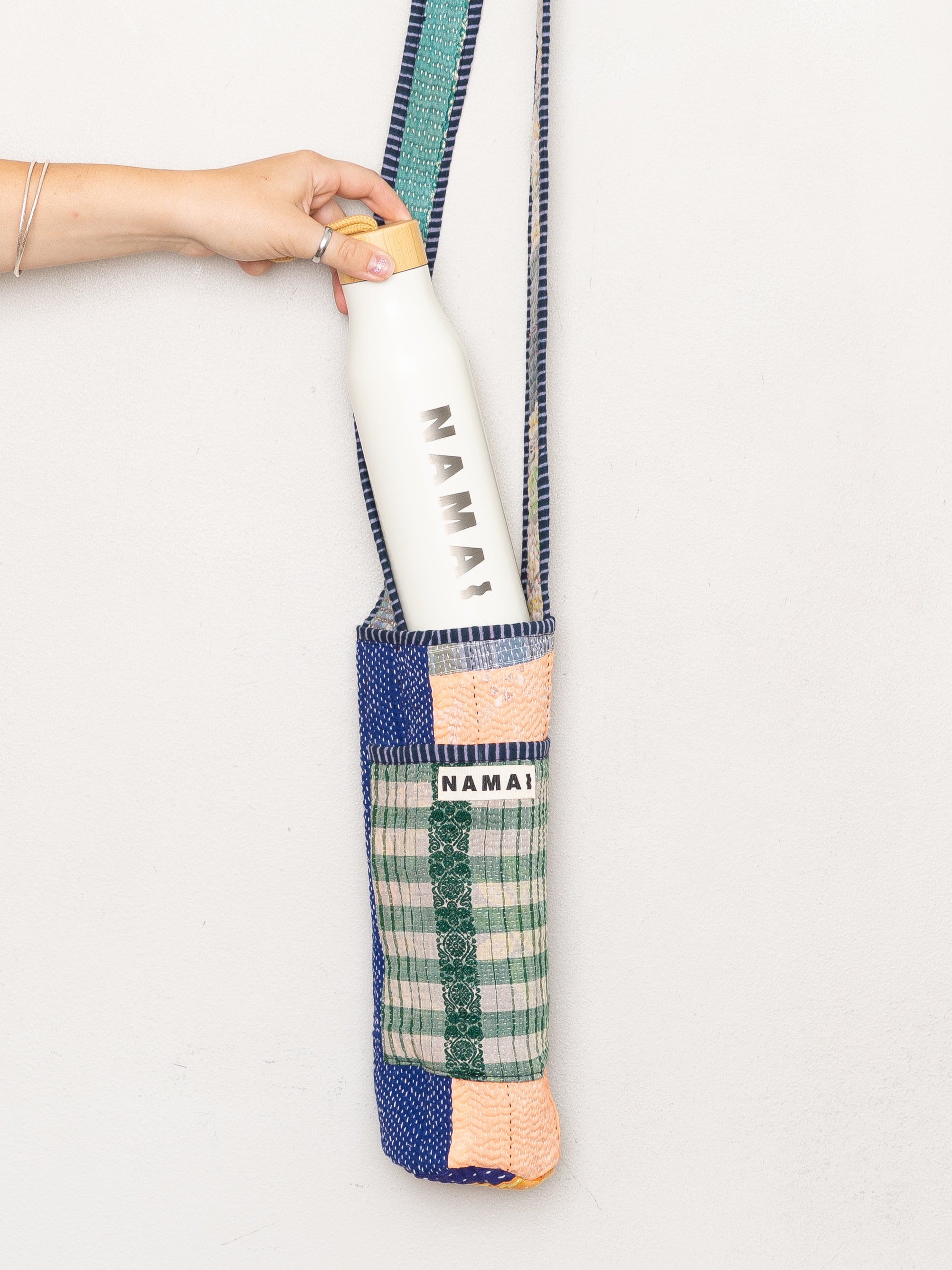 The Lota Quilted Water Bottle Crossbody + NAMAI Water Bottle