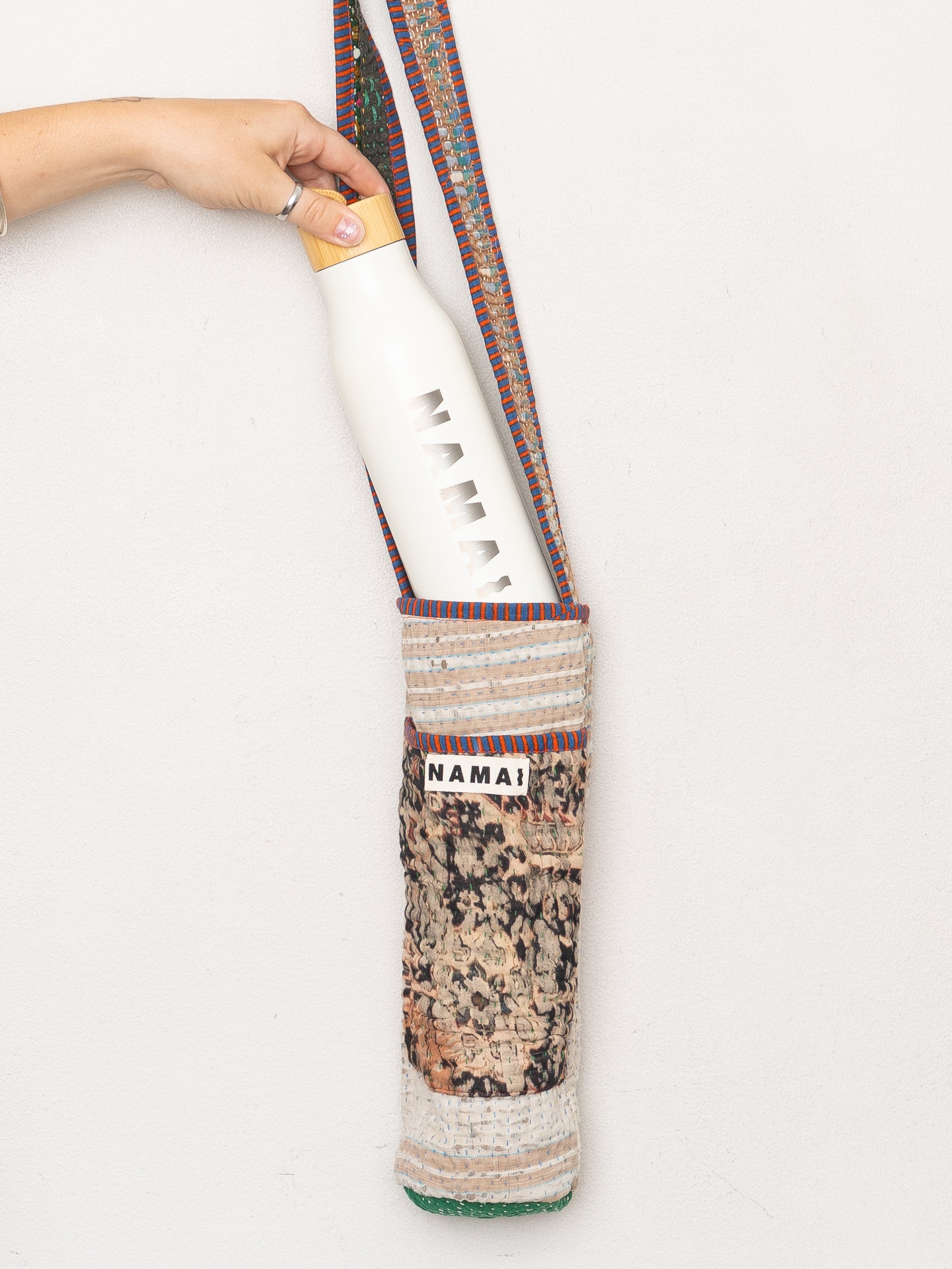 The Lota Quilted Water Bottle Crossbody + NAMAI Water Bottle