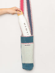The Lota Quilted Water Bottle Crossbody + NAMAI Water Bottle