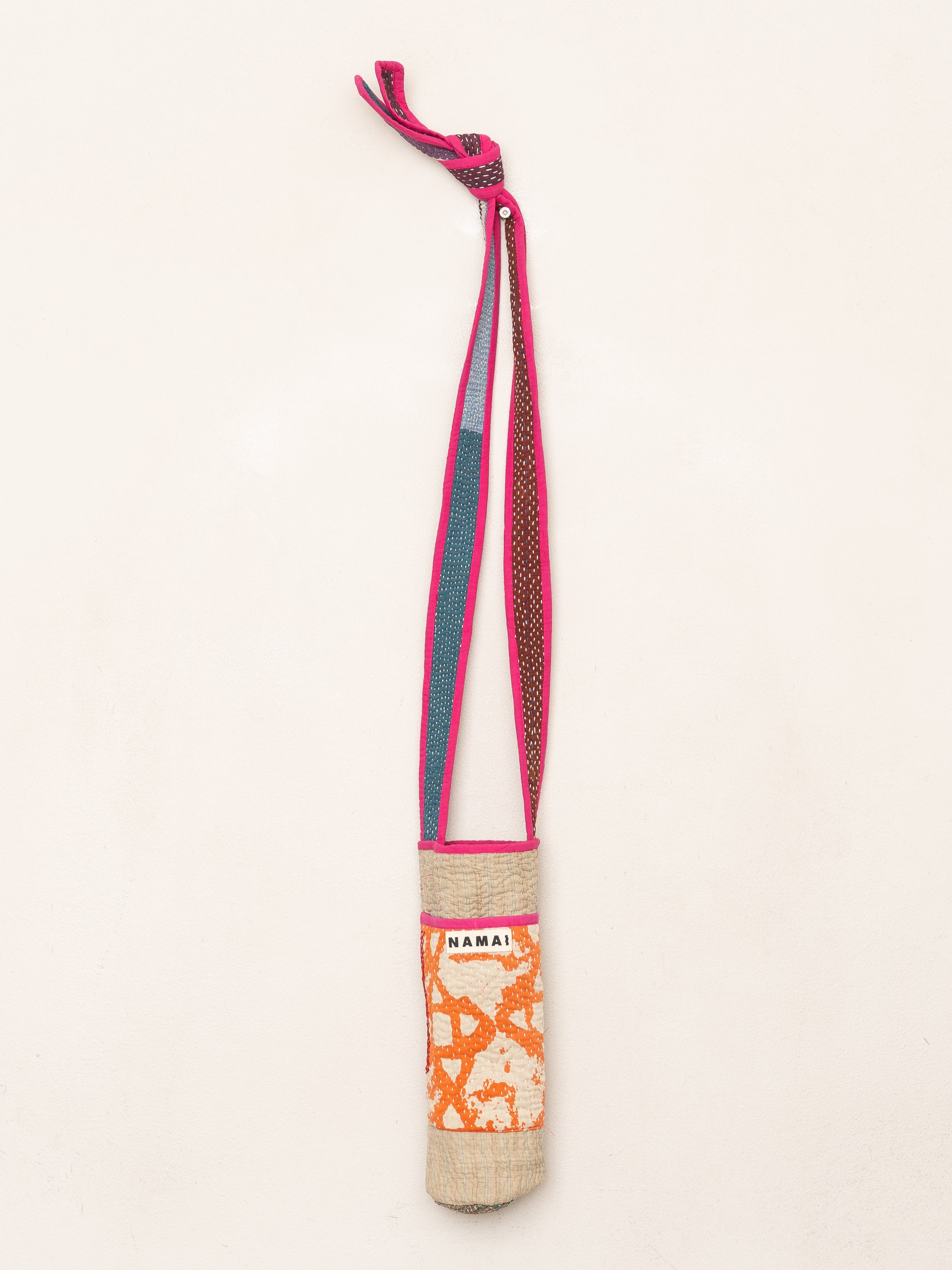The Lota Quilted Water Bottle Crossbody + NAMAI Water Bottle