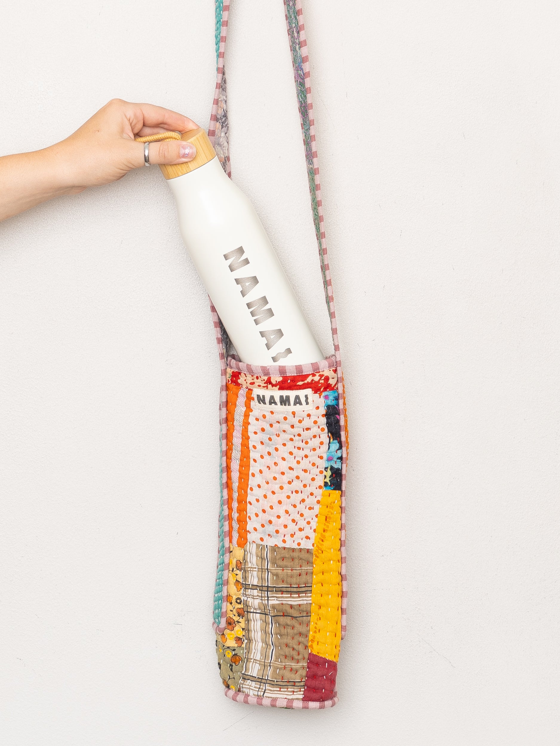 The Lota Quilted Water Bottle Crossbody + NAMAI Water Bottle