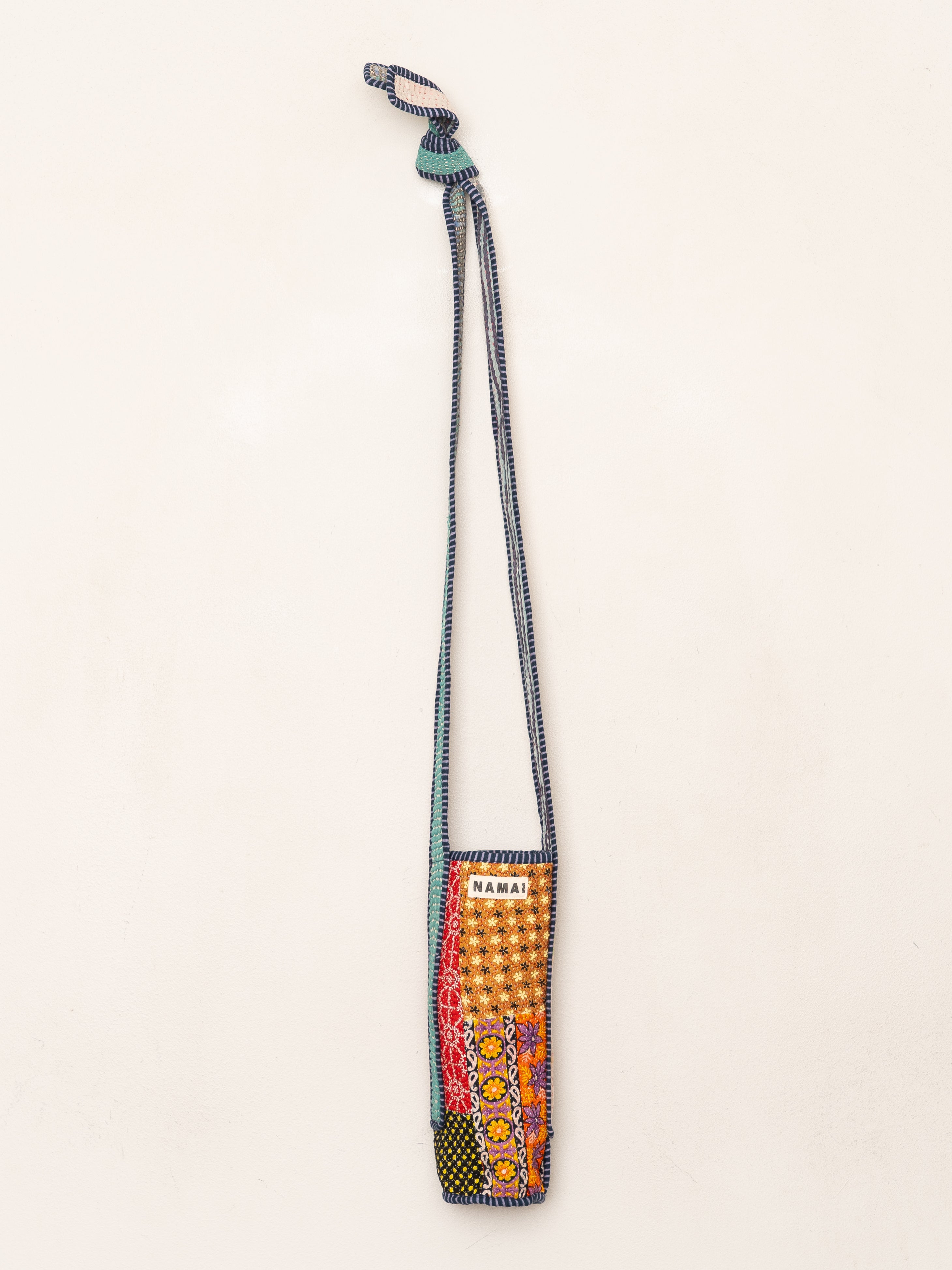The Lota Quilted Water Bottle Crossbody + NAMAI Water Bottle