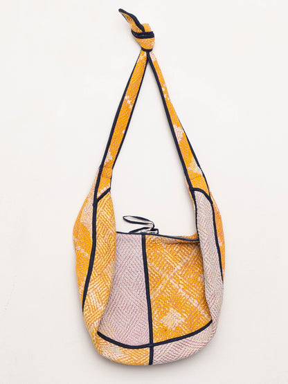 The Chandra Crescent Quilted Crossbody Bag