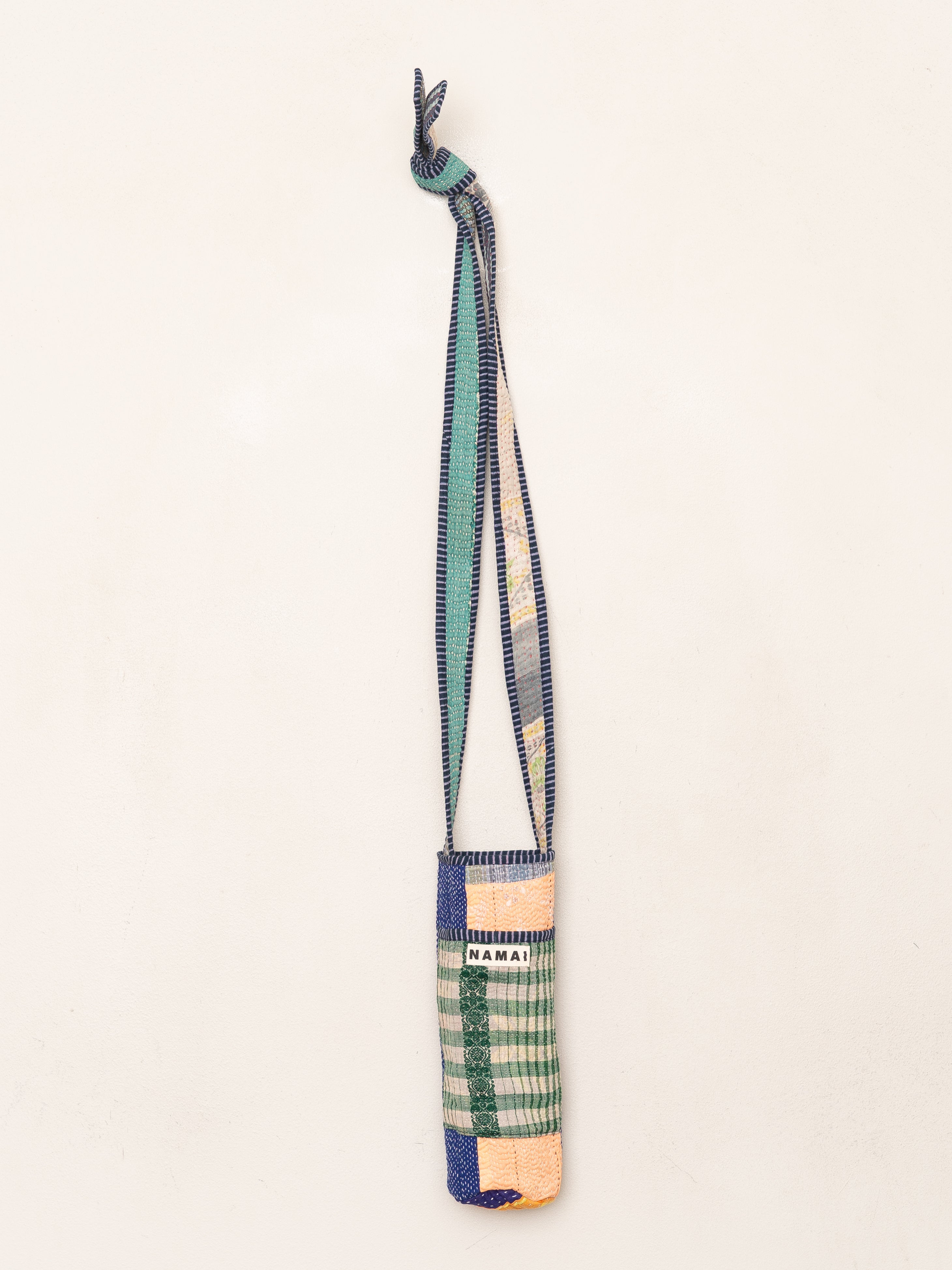The Lota Quilted Water Bottle Crossbody + NAMAI Water Bottle