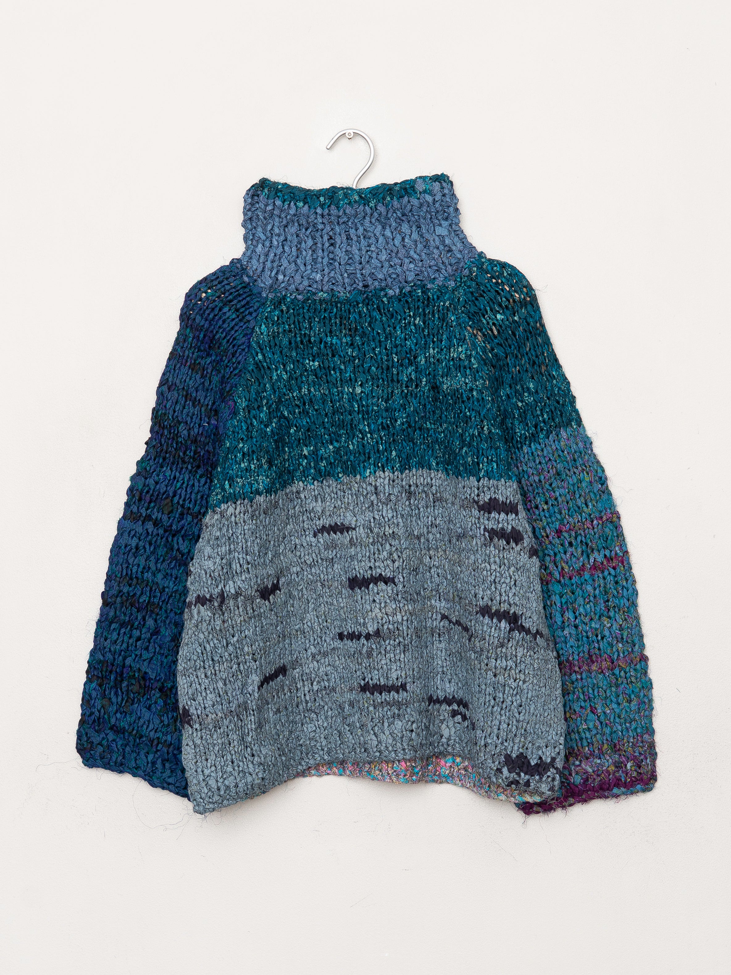 The Vishnu Knitted Silk Roll-Neck Sweater