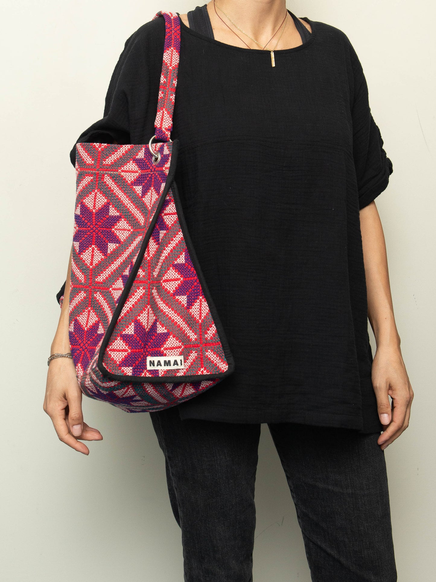 The Sakshi Cross-Stitch Quilted Shoulder Bag