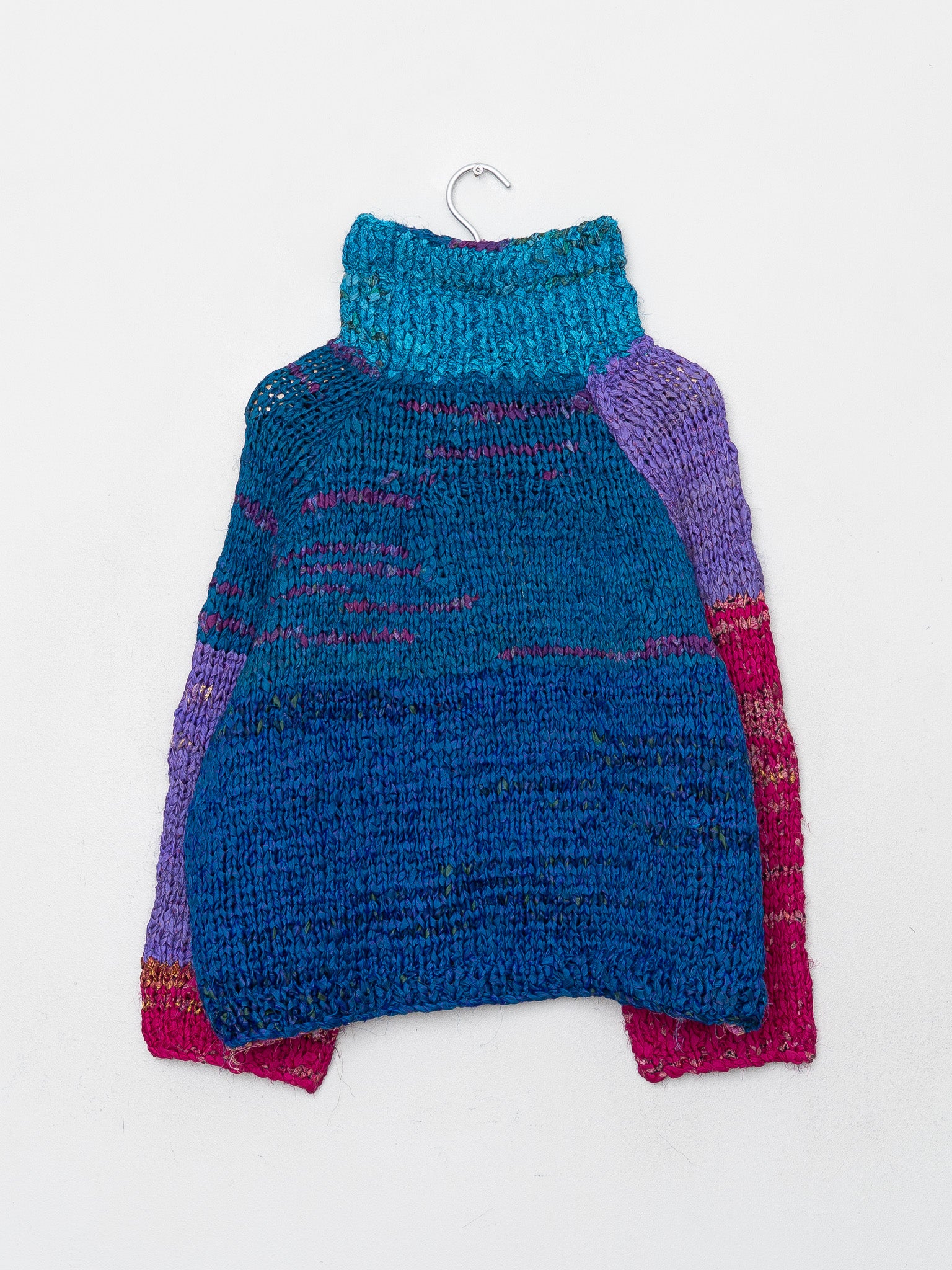 The Vishnu Knitted Silk Roll-Neck Sweater