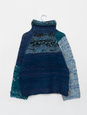 The Vishnu Knitted Silk Roll-Neck Sweater